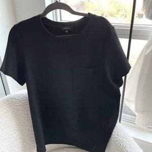 Structured black top with pocket